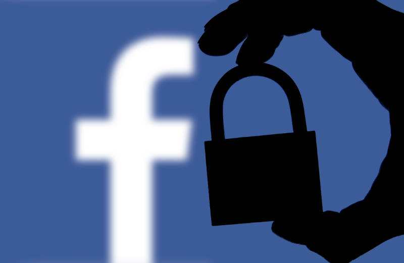 London,,Uk,-,February,5th,2018:,Facebook,Security,Issues.,Silhouette facebook lock